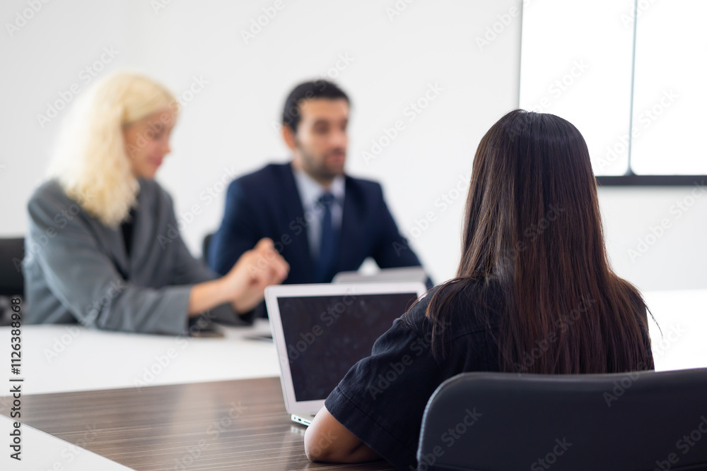 Businesspeople Meeting In Modern Boardroom. Hispanic businessman with team coworkers business discussion in meeting boardroom coworking. Teamwork Businesspeople Meeting In Modern Boardroom. Hispanic businessman with team coworkers business discussion in meeting boardroom coworking. Teamwork