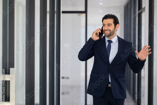 using cellphone. Portrait of Busy Confident successful business people woking in office. rich confident business man owner in office.