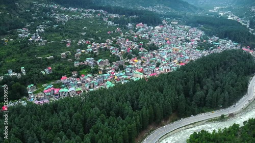 Aerial view of manali with the beas river in himachal pradesh India. Himalayan mountains and colourful local houses nestled in the hills of manali himachal pradesh India.