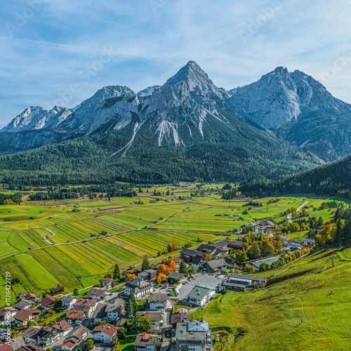 Ausblick ins Ehrwalder Becken rund um Lermoos mit herbstlicher Gebirgskulisse photo