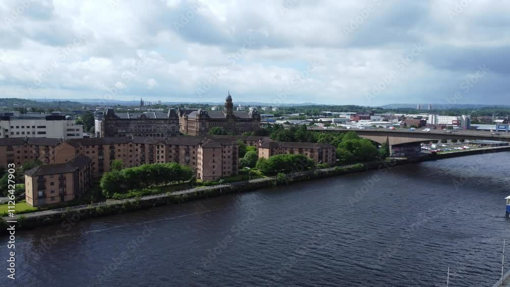 Aerial View of Buildings at Central Glasgow city of Scotland From River Clyde, Great Britain. June 5th, 2024. High Angle Footage Was Captured with Drone's Camera During Cloudy and Windy Day. Aerial View of Buildings at Central Glasgow city of Scotland From River Clyde, Great Britain. June 5th, 2024. High Angle Footage Was Captured with Drone's Camera During Cloudy and Windy Day.