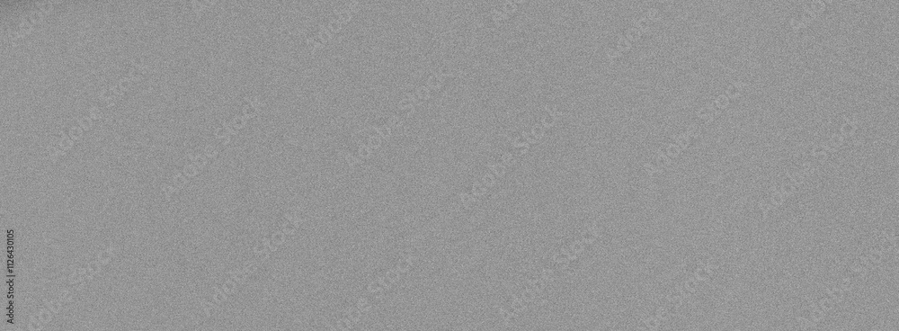 Dark, grainy backdrop with scattered light spots creating a gradient transition for a dramatic and elegant design