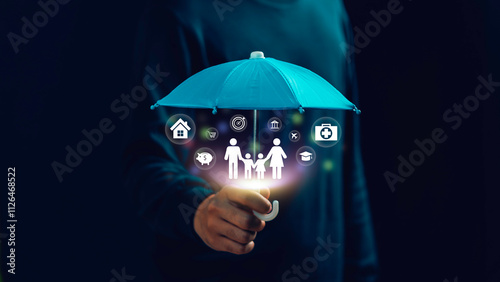 Obraz na płótnie Life insurance and family protection concept: a family under a blue umbrella, symbolizing home, health, education, and financial assets for security, trust, and long-term stability. w salonie