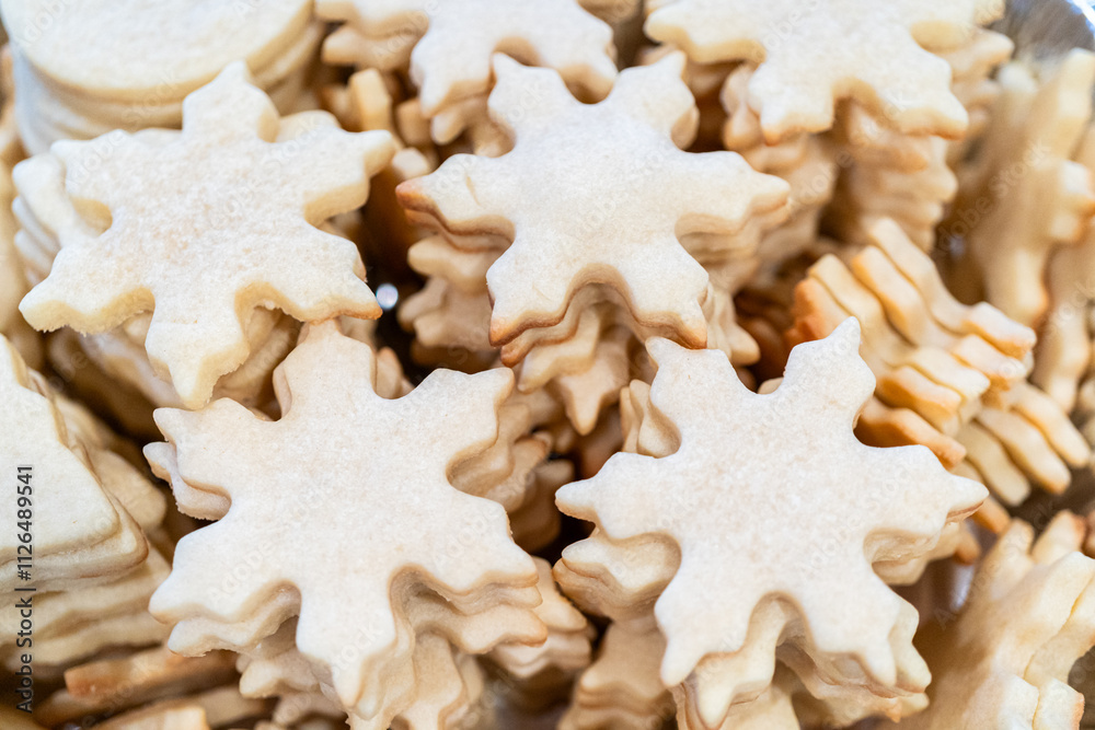 Baking Snowflake-Shaped Sugar Cookies for Homemade Christmas Gifts Baking Snowflake-Shaped Sugar Cookies for Homemade Christmas Gifts