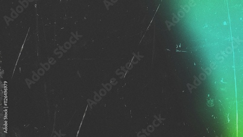 Green light leak background with grunge film grain and dust texture