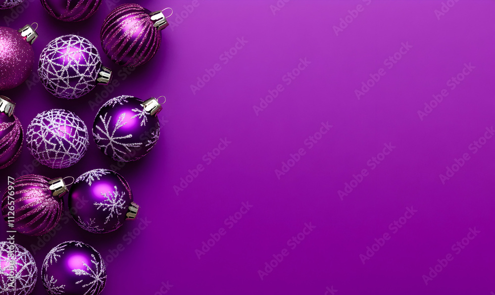 Elegant purple Christmas baubles arranged on a vibrant purple background, leaving ample space for text or design elements. Perfect for festive greetings or holiday promotions. Elegant purple Christmas baubles arranged on a vibrant purple background, leaving ample space for text or design elements. Perfect for festive greetings or holiday promotions.