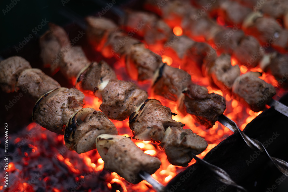 Grilled Kebab From Fresh Meat Pork Cooking On Metal Skewer Outdoors Grilled Kebab From Fresh Meat Pork Cooking On Metal Skewer Outdoors