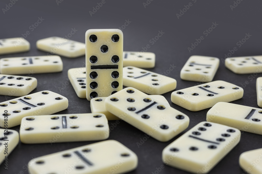 Big heap from dominoes on a dark background Big heap from dominoes on a dark background