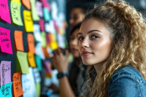 Wallpaper Mural Young Woman in Brainstorming Session, Confident and Focused Torontodigital.ca