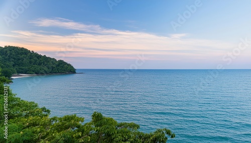 Captivating View of Blue Sea and Pink Sky: A Stunning Display of Natures Beauty at Sunset, Showcasing Vibrant Colors and Tranquil Waters in a Serene Coastal Landscape