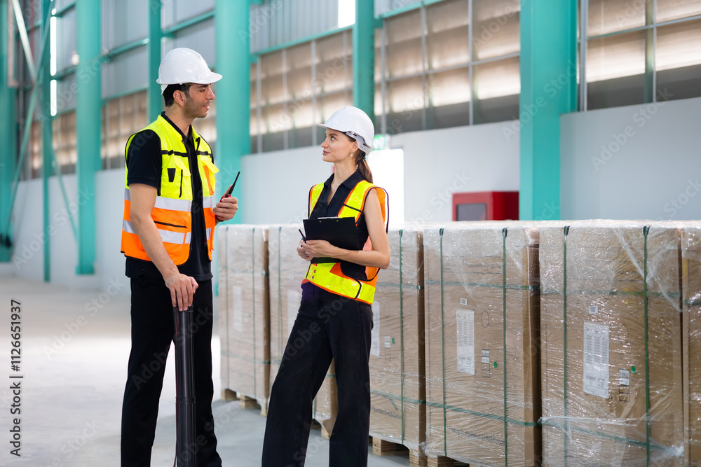 working woman. Caucasian woman warehouse staff Employees worker in Hard Hat working at large warehouse factory. transport and storage of goods. supply chain and delivery. Insustry inventory warehouse working woman. Caucasian woman warehouse staff Employees worker in Hard Hat working at large warehouse factory. transport and storage of goods. supply chain and delivery. Insustry inventory warehouse