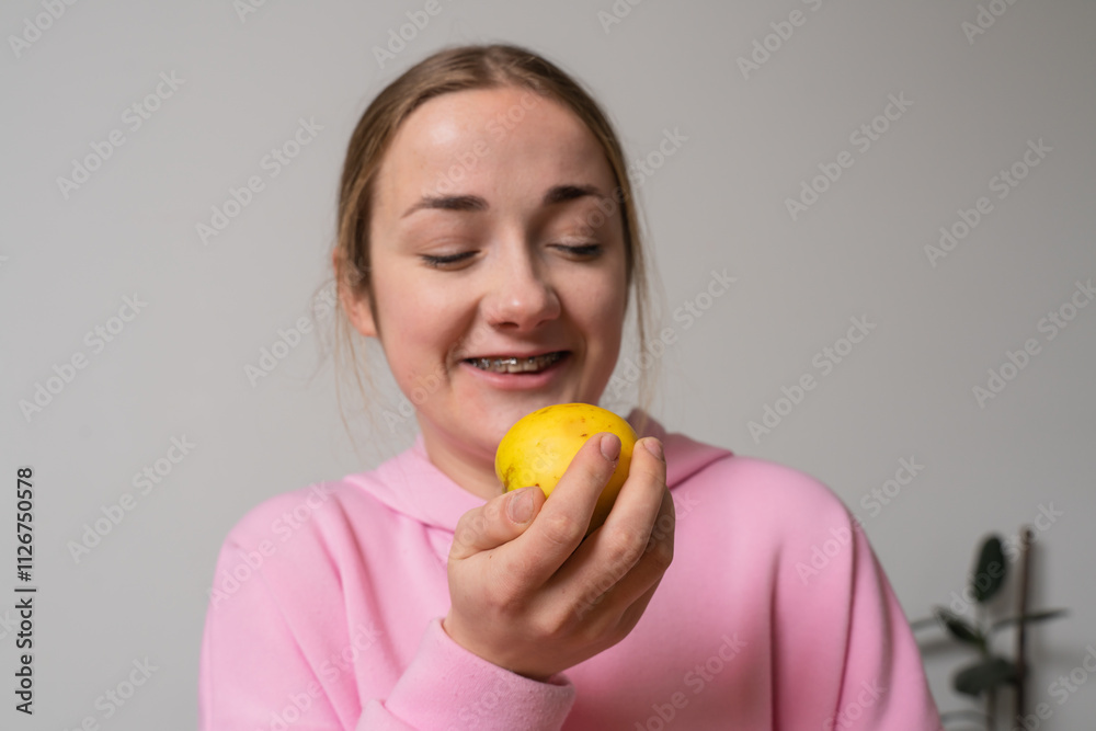 Girl with braces eat apple fruit Girl with braces eat apple fruit