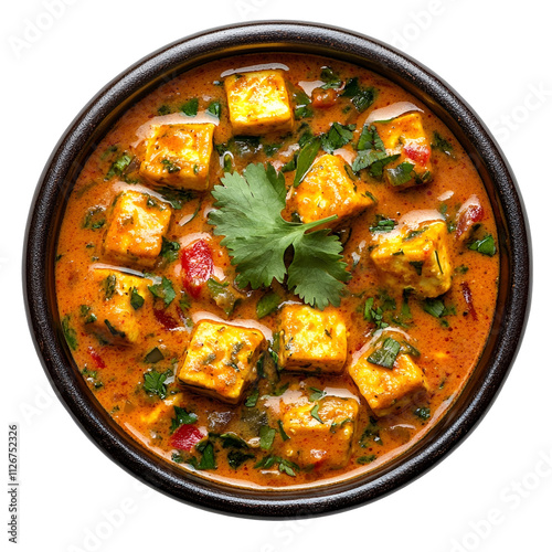 Top view of an extremely perfect looking Paneer Shorba in a dark ceramic bowl isolated on a white transparent background photo