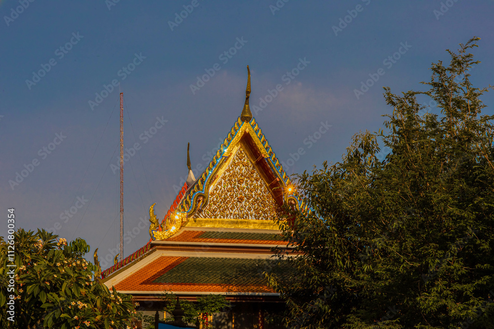 Naklejka premium Picture of pagodas in Wat Pho in Bangkok, Thailand, one of Thailand's oldest temples.
