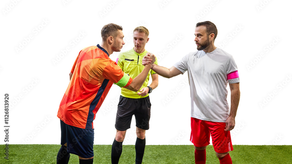 Obraz premium Two serious men, soccer players from opposite team, standing next to referee and shaking hands isolated on white background. Concept of sport, fair play, competition, control, rules