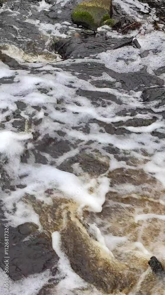 Flowing water on the rocks. 