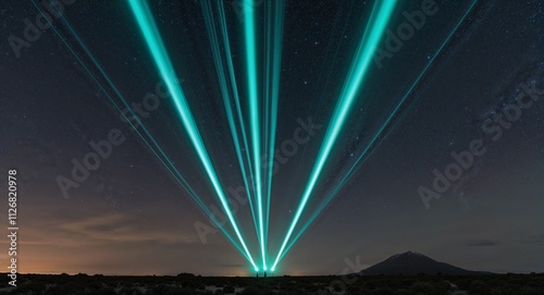 Setting off synchronized teal cometlike trails that sweep across the vast night sky photo