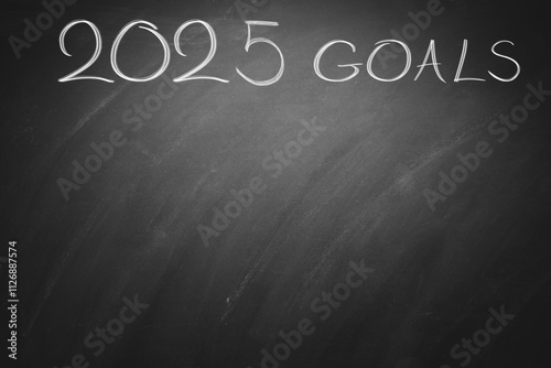 2025 New Year To do List  wishes and Goals on black board. Chalkboard photo