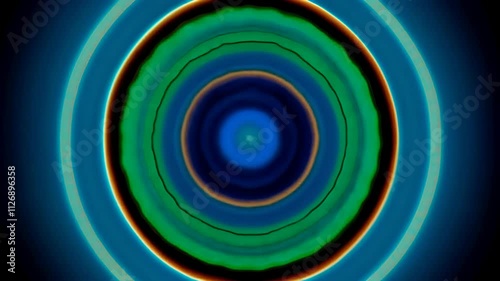 animation of gentle loop of concentric circles softly expanding and contracting, each ring changing colors