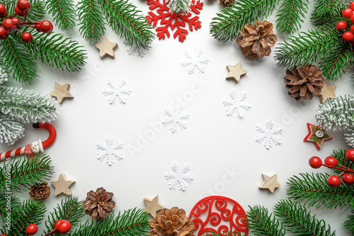 Obraz na płótnie Christmas background. Christmas eve concept. Top view of gift boxes, fir branches, toys, on white background. w salonie