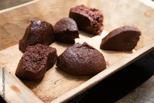 Wallpaper Mural Organic chocolate from the Oaxaca region of Mexico produced in a traditional way on a metate, an ancient stone tool for grinding products. Torontodigital.ca