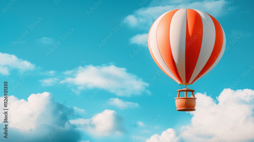 Naklejka premium A vibrant hot air balloon floats peacefully against a clear blue sky, surrounded by fluffy white clouds, embodying freedom and adventure.