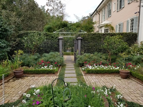 garden with flowers and pathway lanscaped photo