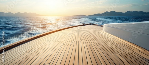 Scenic view from a boat's deck during sunset on the water.