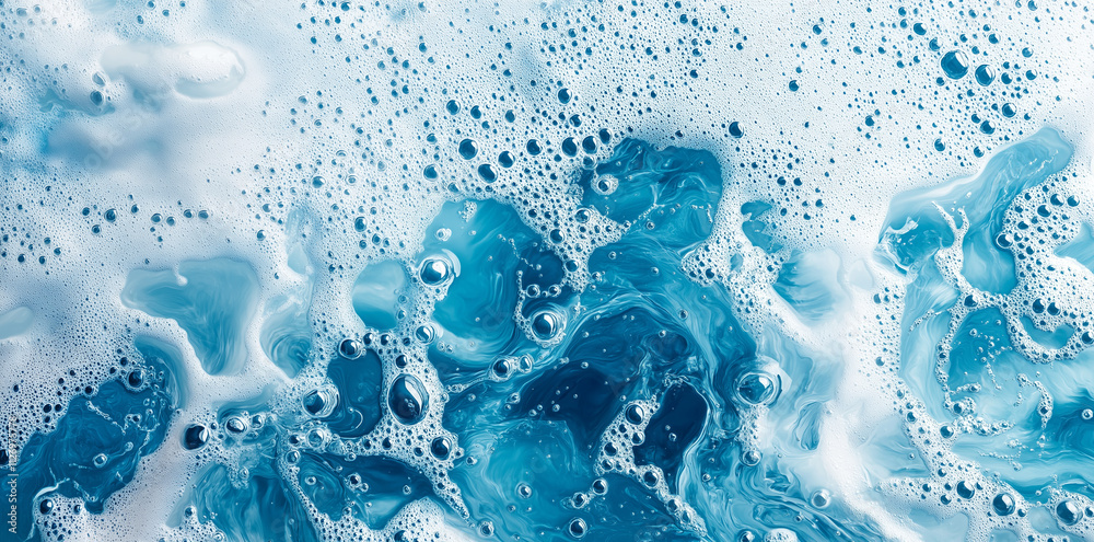 Water splashes on a blue background, an abstract banner of water drops and splashes for design
Water splashes on a blue background, an abstract banner of water drops and splashes for design