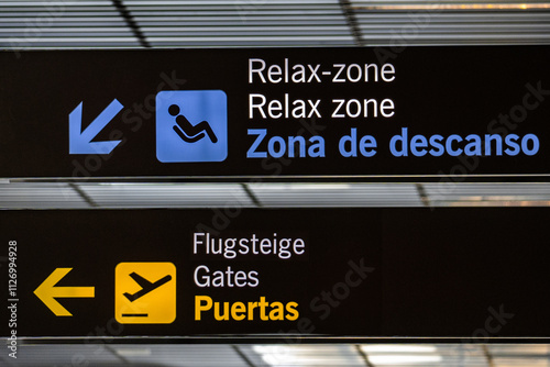 Flight, yellow puertas gates boarding panels at the airport photo