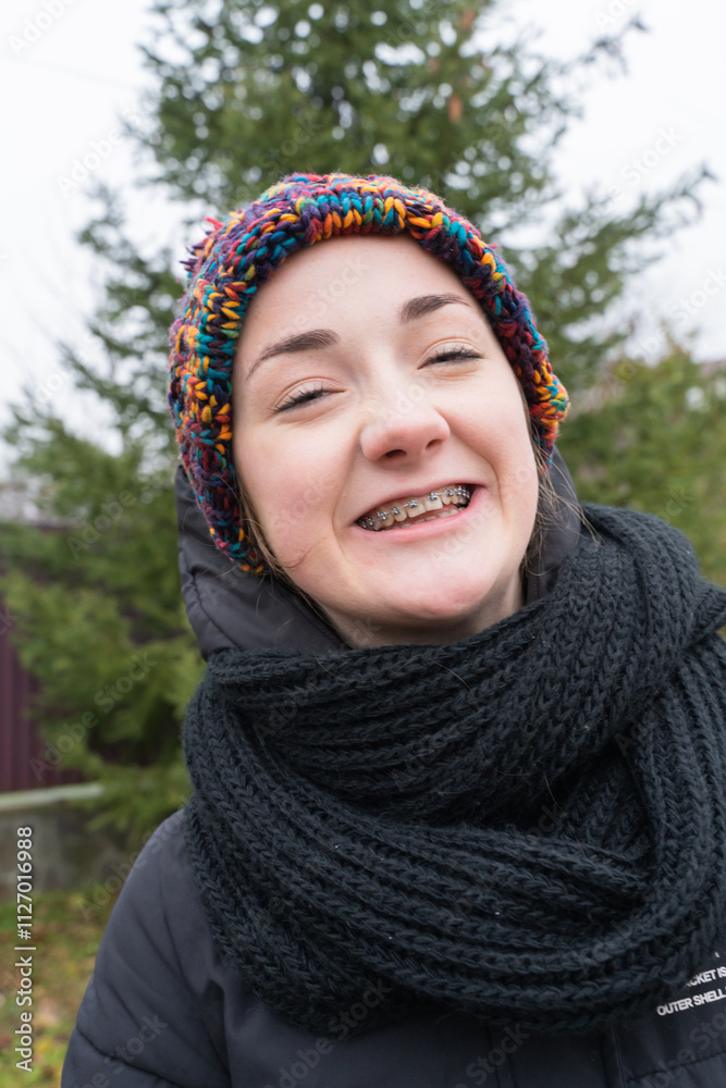 Portrait of young girl with braces outdoor at winter Portrait of young girl with braces outdoor at winter