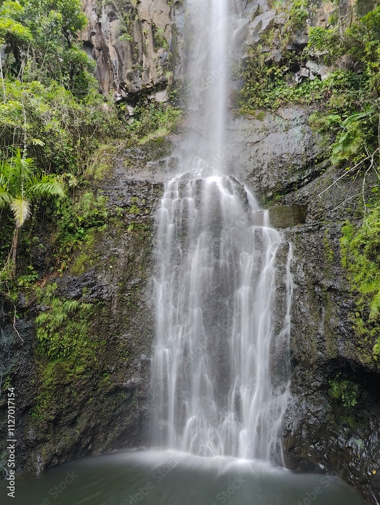 The stunning big wateralls running over the black lava rocks on Maui Island in Hawaii The stunning big wateralls running over the black lava rocks on Maui Island in Hawaii