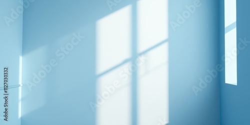 Serene Light Patterns on a Pale Blue Wall in a Minimalist Room