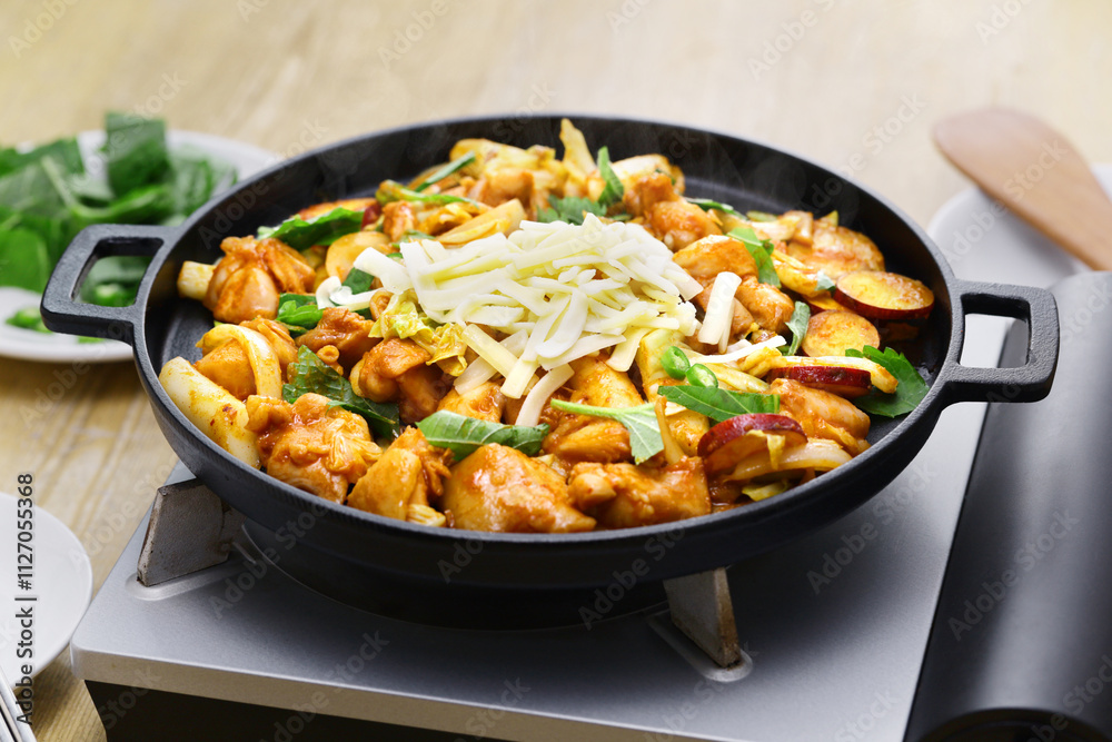 Cheese Dakgalbi (spicy stir-fried chicken topping with cheese), Korean food Cheese Dakgalbi (spicy stir-fried chicken topping with cheese), Korean food