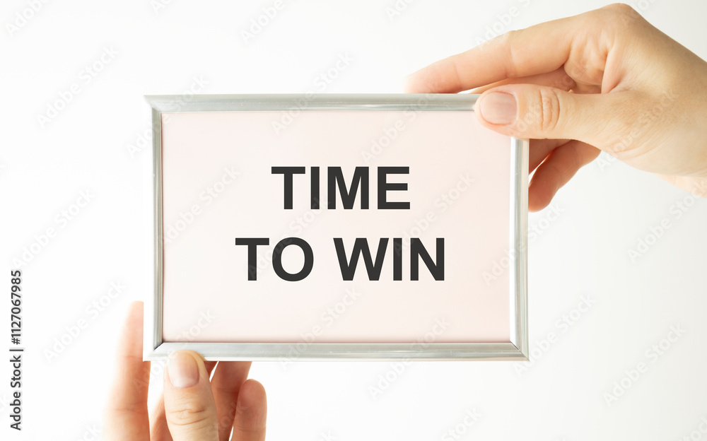 TIME TO WIN text on the pink page. White background, business concept. TIME TO WIN text on the pink page. White background, business concept.