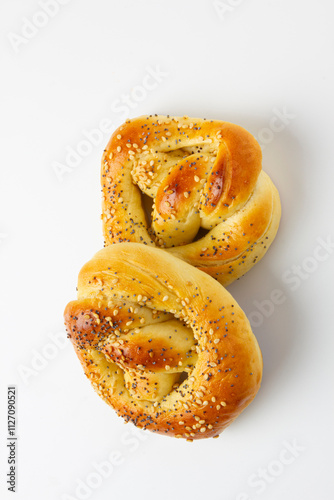 Sweet bread rolls with sesame seeds and poppy seeds..