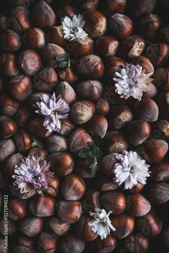 Still Life of Dried Flowers and Hazelnuts in Warm Earthy Tones