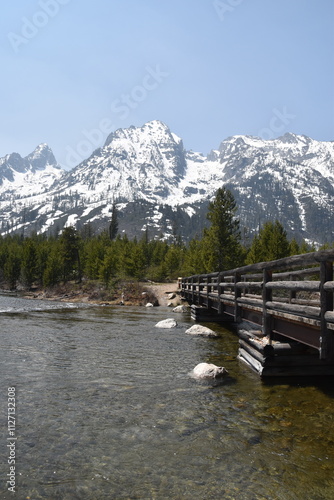 Hiking in the stunning mountain and lake scenery in the Grand Teton National Park, Wyoming photo