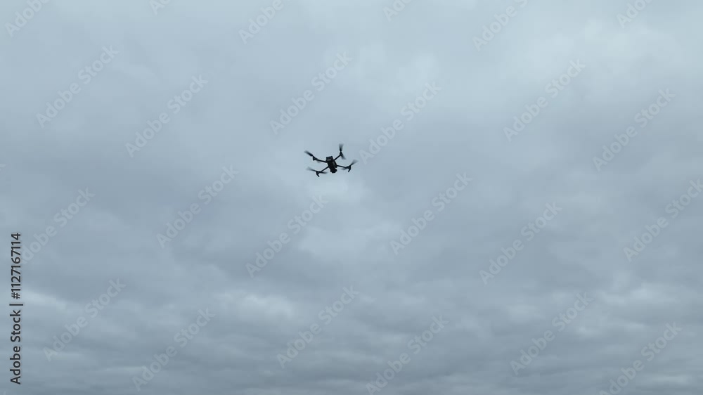 Aerial view of a drone flying over a construction site. Aerial view of a drone flying over a construction site.