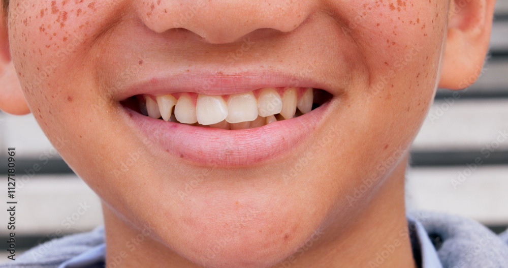 Obraz premium Smile, dental and closeup of child in city for happiness, orthodontist and teeth cleaning. Pride, wellness and oral hygiene with zoom of mouth of person in outdoor for confidence, gum care and lips