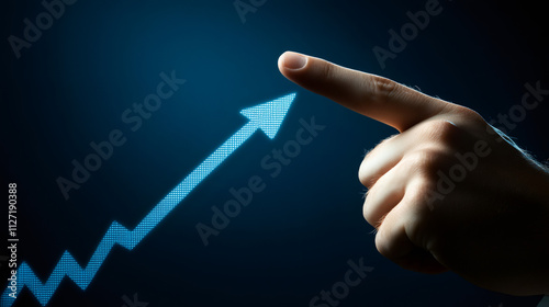 Business success and financial growth symbolized by a hand pointing to a growing arrow chart