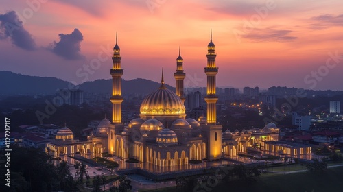 A stunning mosque illuminated at sunset, showcasing intricate architecture and serene beauty. photo