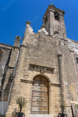 Divino Salvador church in the old town of the white beautiful village of Vejer de la Frontera in a sunny day, Cadiz province, Andalusia, Spain