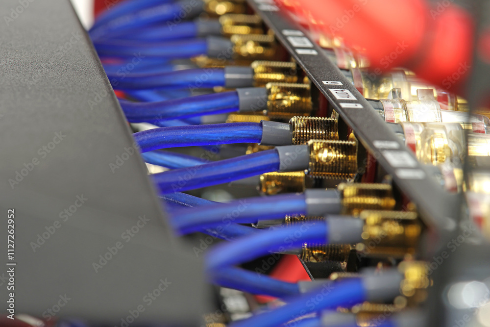Connection of electronic modules in a multimedia telecommunication rack. Soft focus. Connection of electronic modules in a multimedia telecommunication rack. Soft focus.