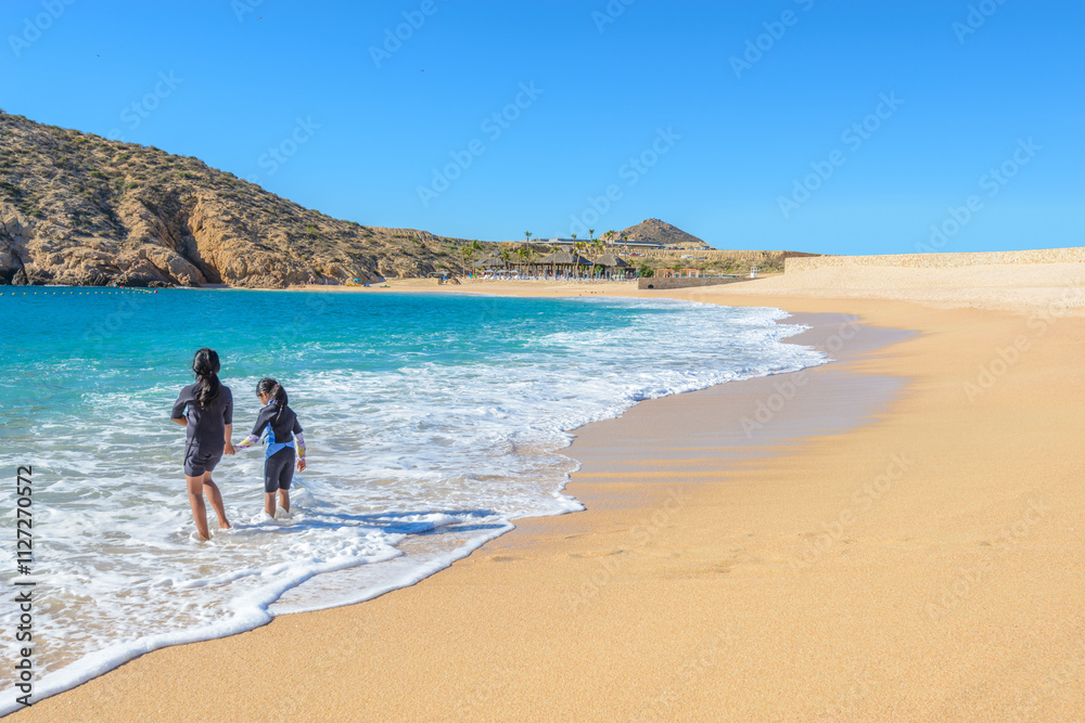 Santa Maria Beach, Cabo San Lucas, Mexico. Different stages of the fantastic ocean waves. Rocky and sandy beach. Santa Maria Beach, Cabo San Lucas, Mexico. Different stages of the fantastic ocean waves. Rocky and sandy beach.