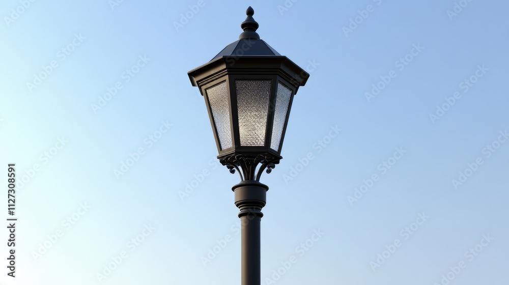 Elegant street lamp post against a clear blue sky showcasing its intricate curved design and classic architecture. Elegant street lamp post against a clear blue sky showcasing its intricate curved design and classic architecture.