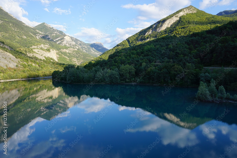 panoramic view of Serre Ponçon lake, Southern Alps, France with mirror reflection panoramic view of Serre Ponçon lake, Southern Alps, France with mirror reflection