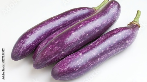Wallpaper Mural Purple eggplants arranged on a white background showcasing their vibrant color and unique texture for culinary and agricultural themes. Torontodigital.ca
