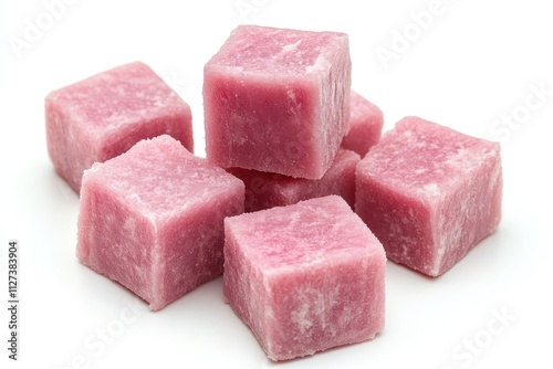 A cluster of pink, cube-shaped food items, likely a type of candy or confectionery.