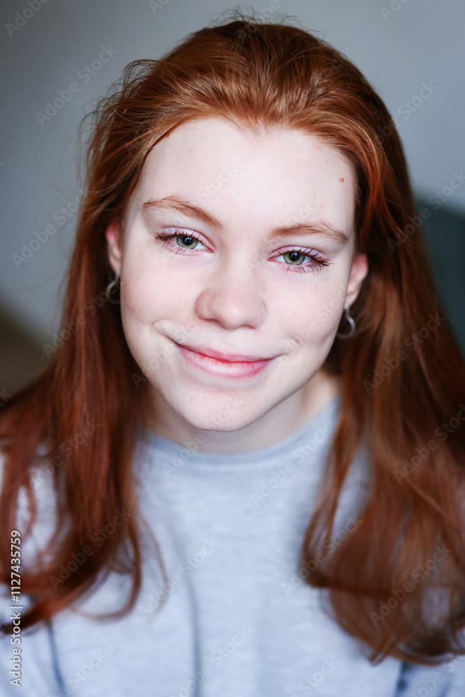 Close up portrait of young red hair girl at the isolated white background with copy space Close up portrait of young red hair girl at the isolated white background with copy space